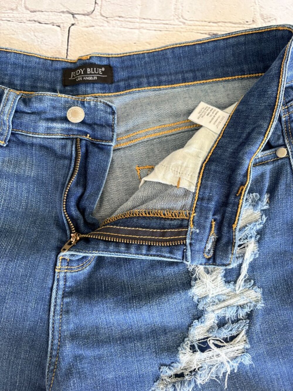 Judy Blue Mid-Rise Distressed Tulip Hem Cutoff Denim Shorts IXL - Picture 5 of 10